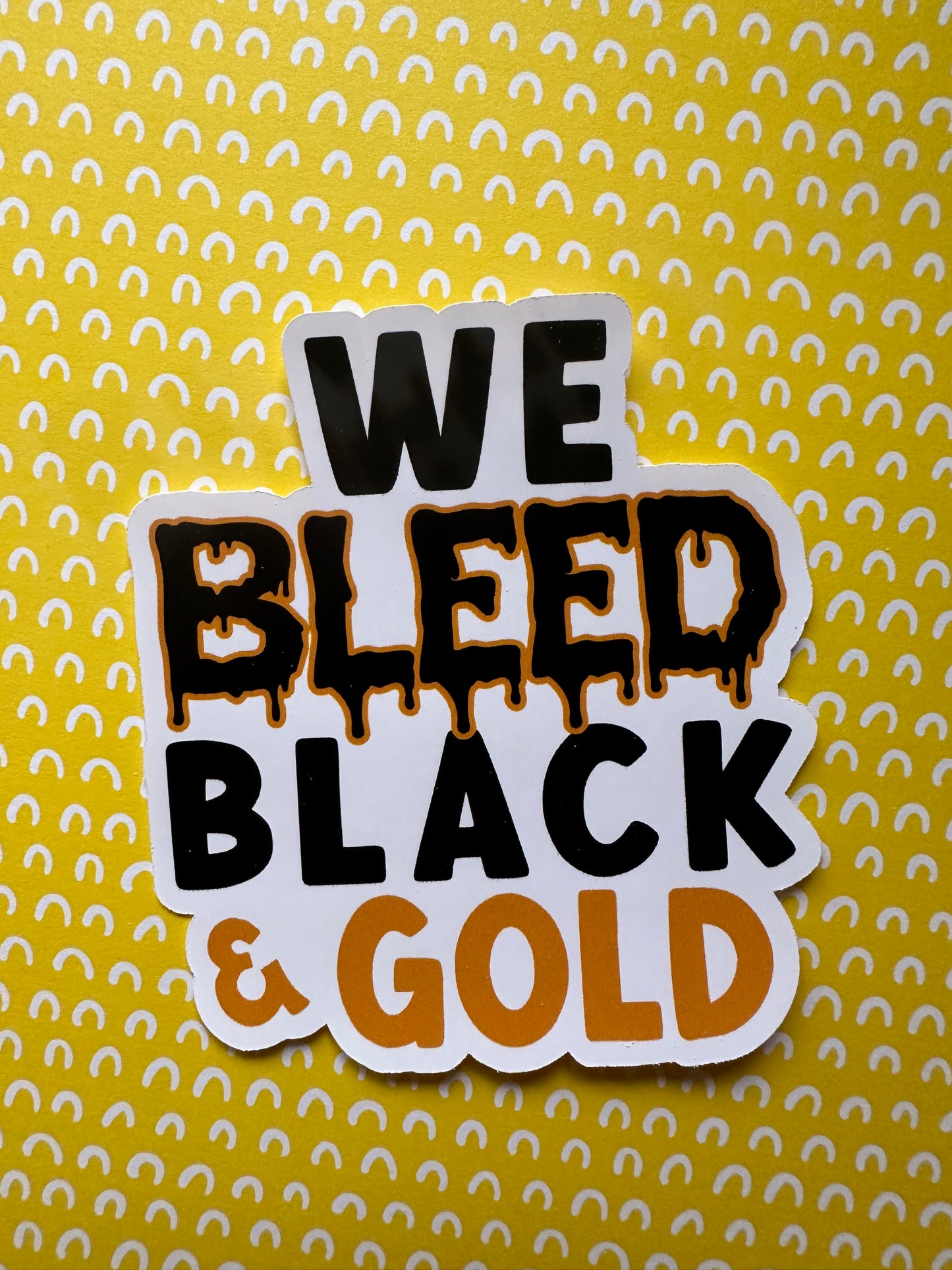 We Bleed Black and Gold Sticker